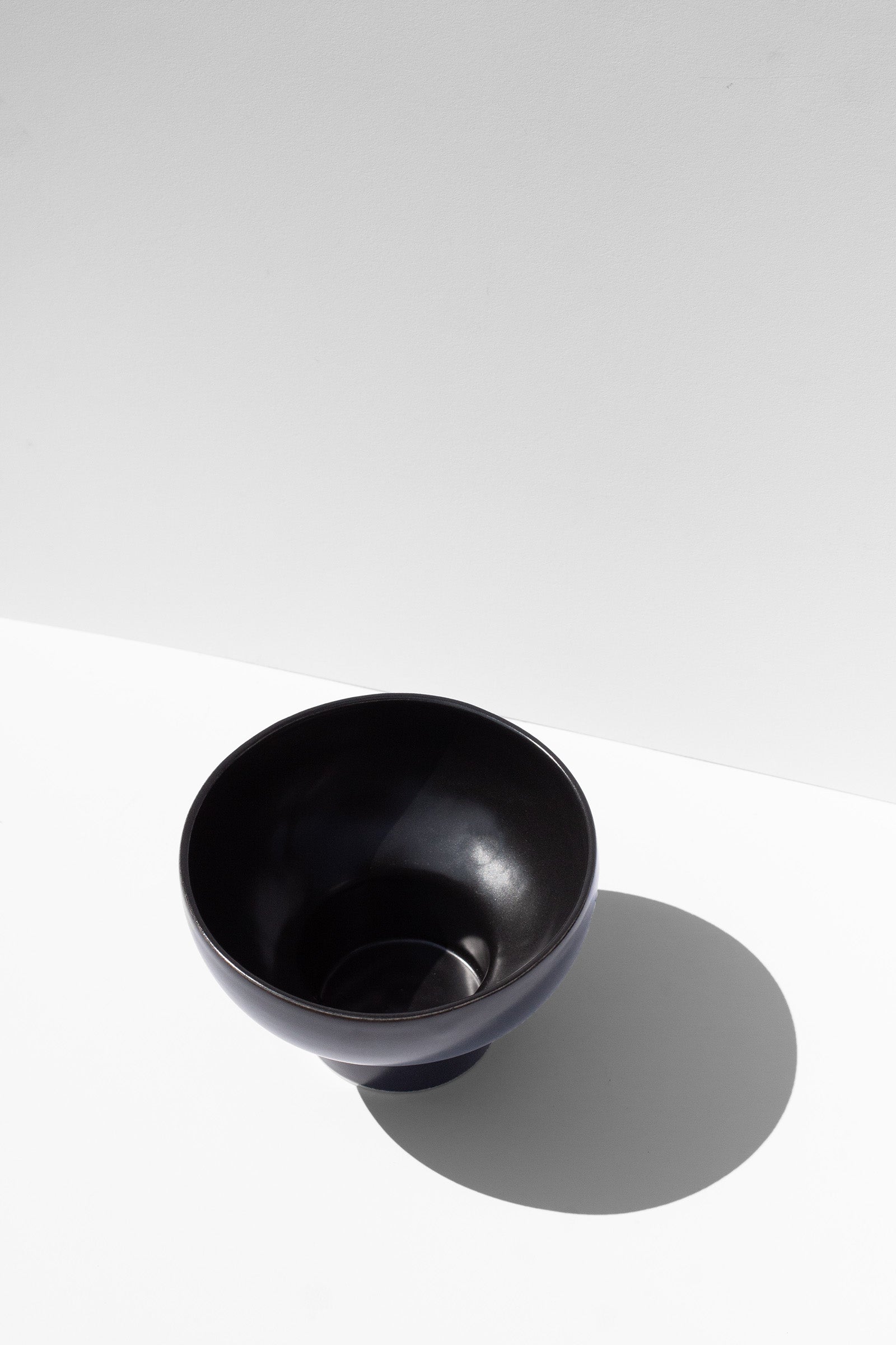 Handmade Black stemless cocktail glasses with wide rim and pedestal base, stackable
