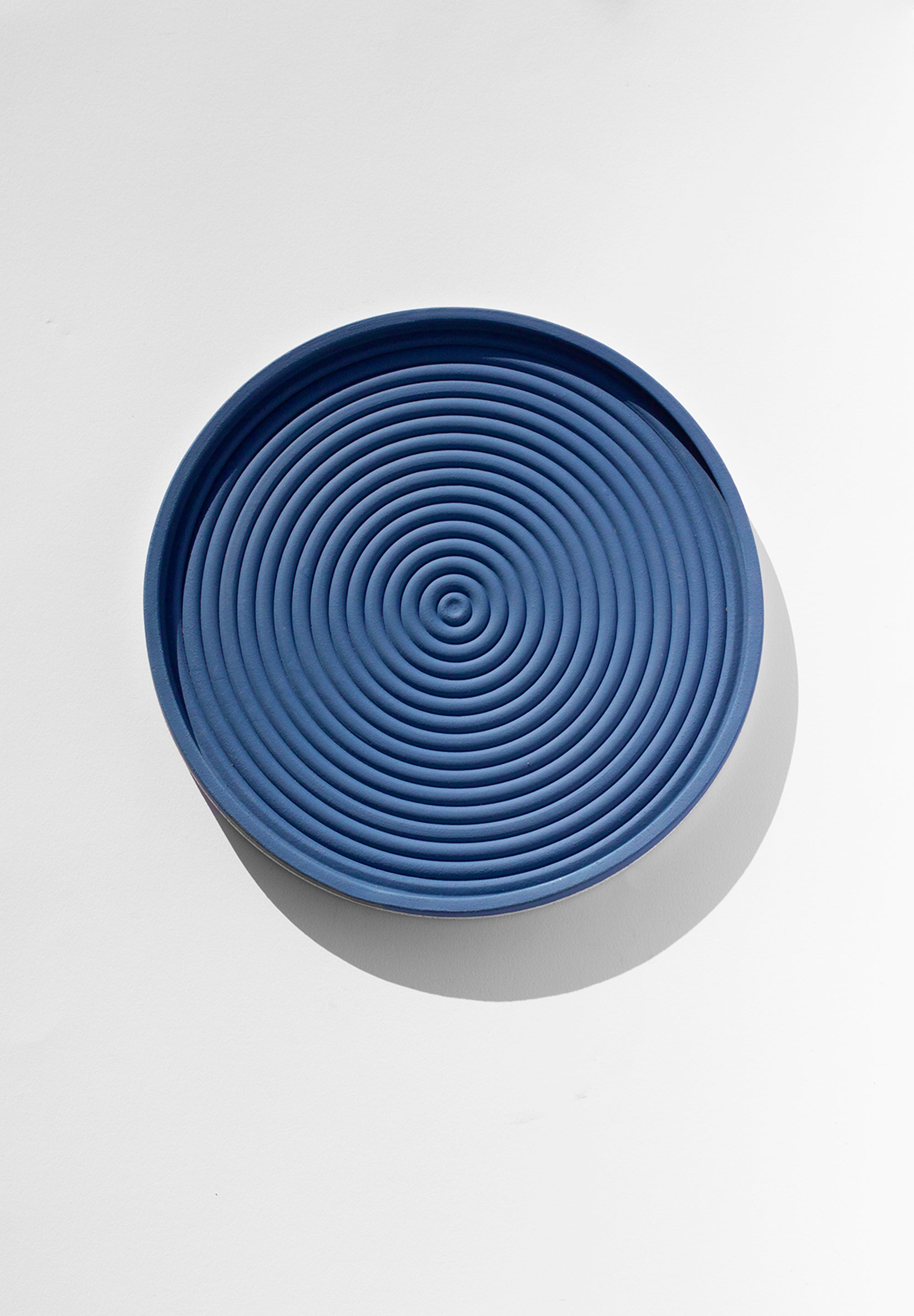 Handmade Cobalt blue serving platter with concentric circle design and speckled finish