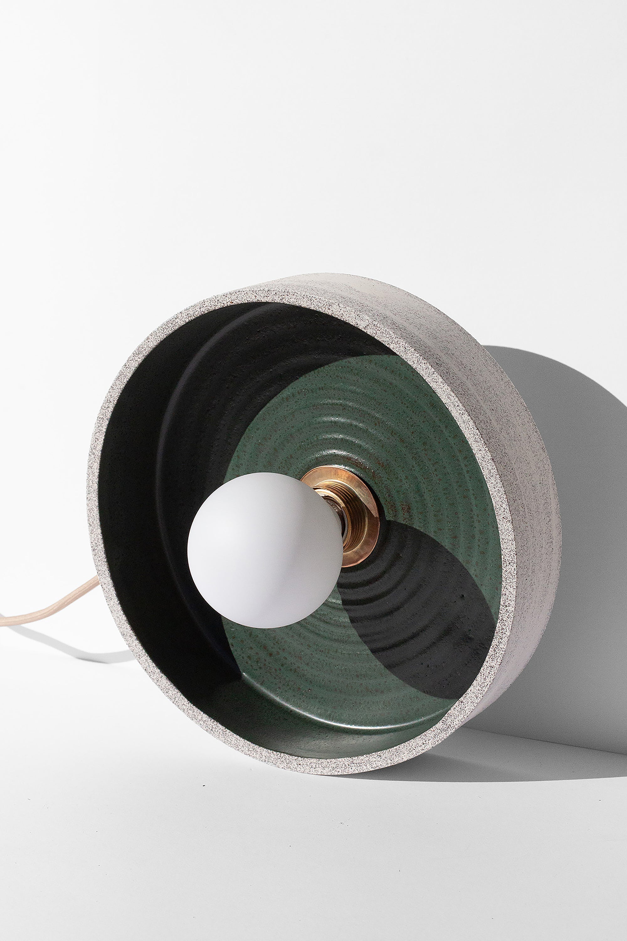 Handmade Green pendant light with concentric circle design and natural speckled finish