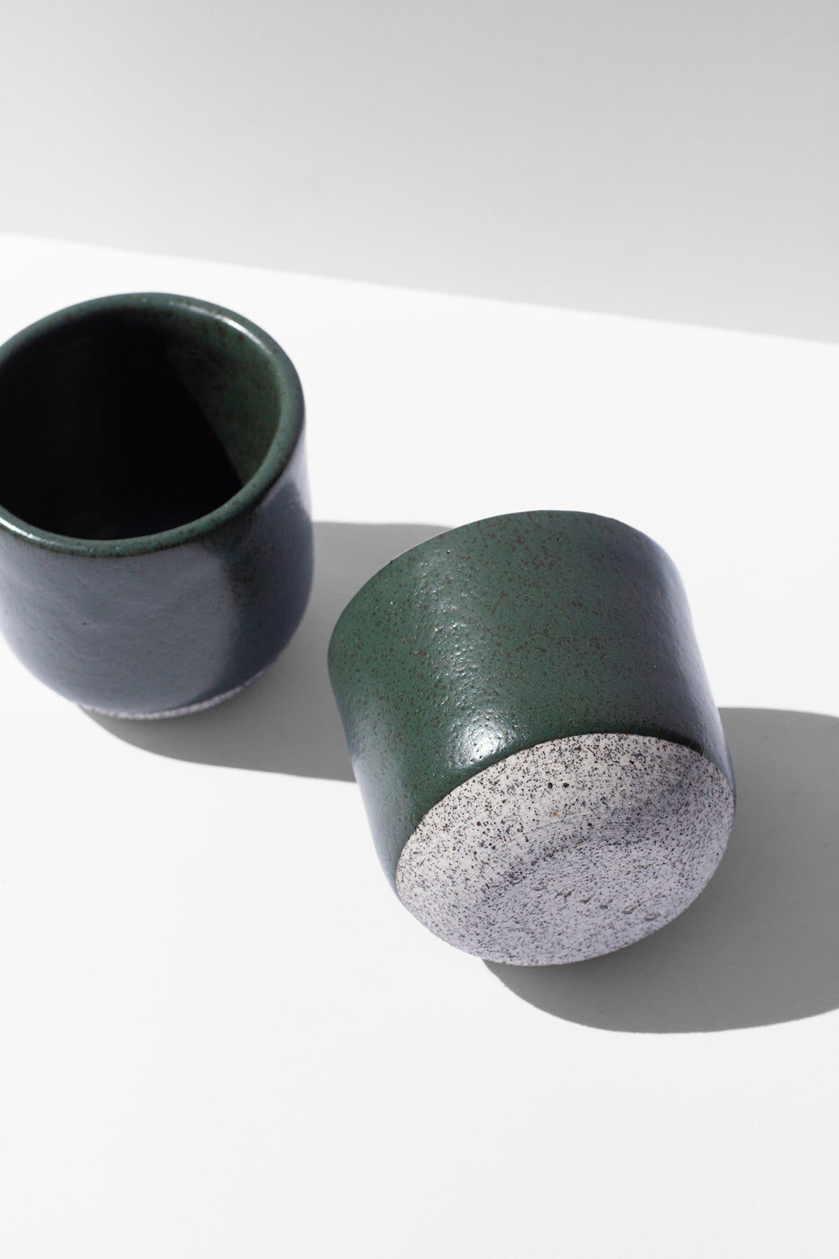 Handmade Small green cups for sipping espresso or spirits with speckled finish