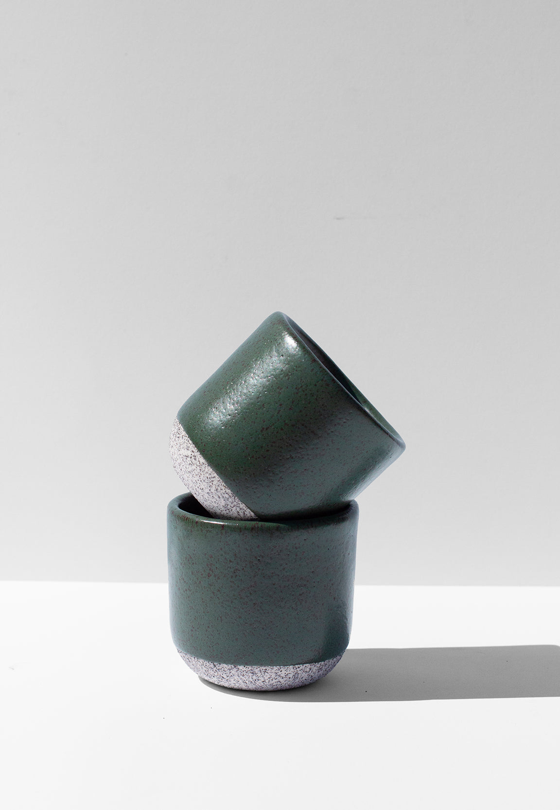 Handmade Small green cups for sipping espresso or spirits with speckled finish