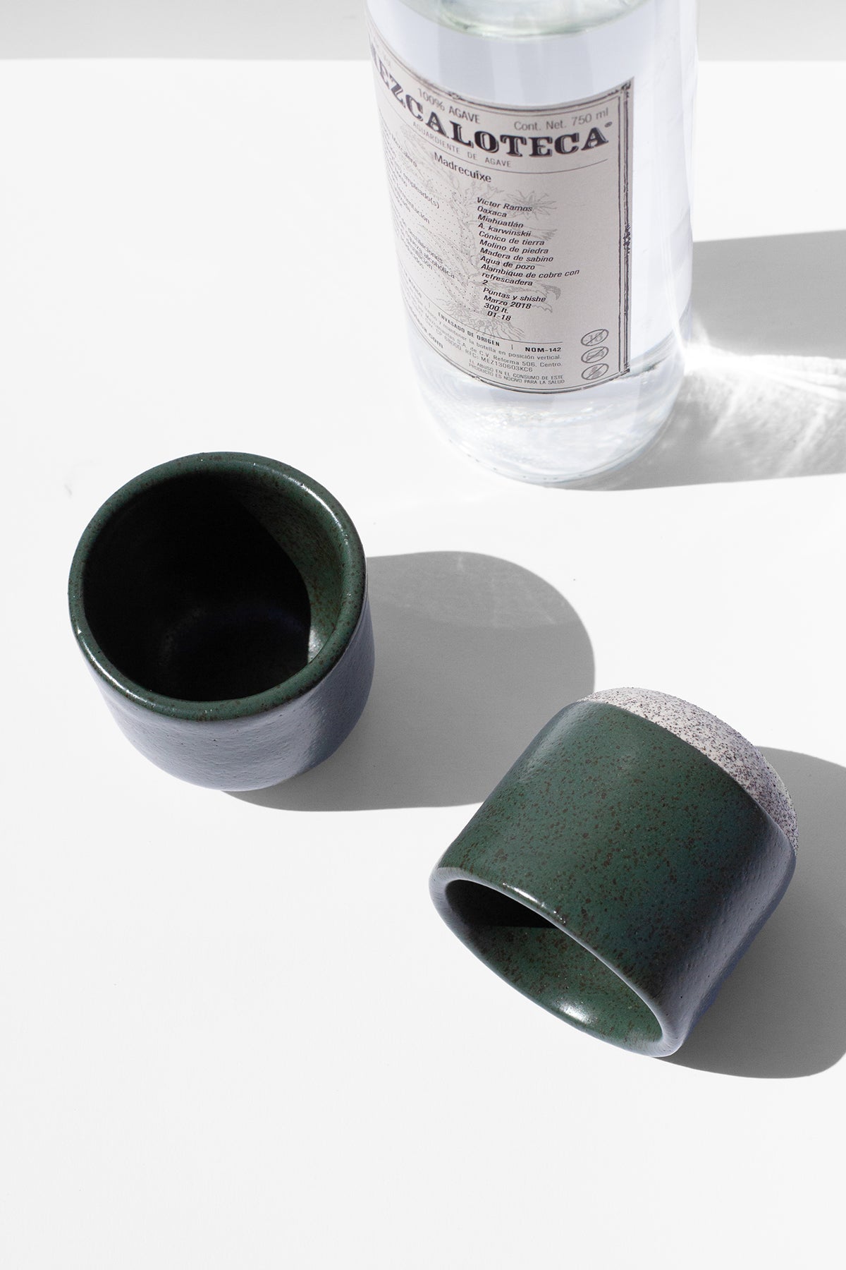 Handmade Small green cups for sipping espresso or spirits with speckled finish