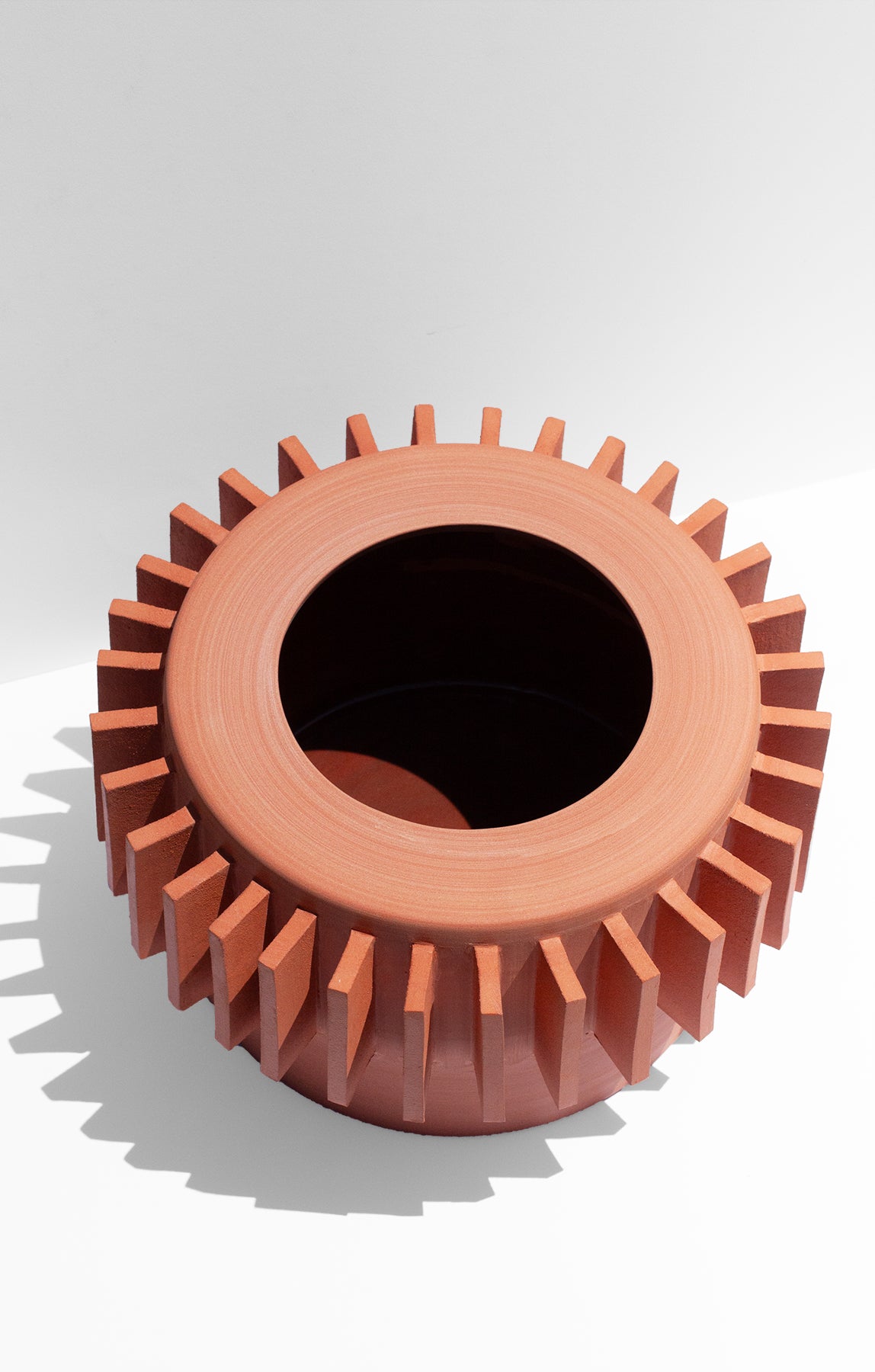 Handmade Terra cotta planter with flange design around the outside