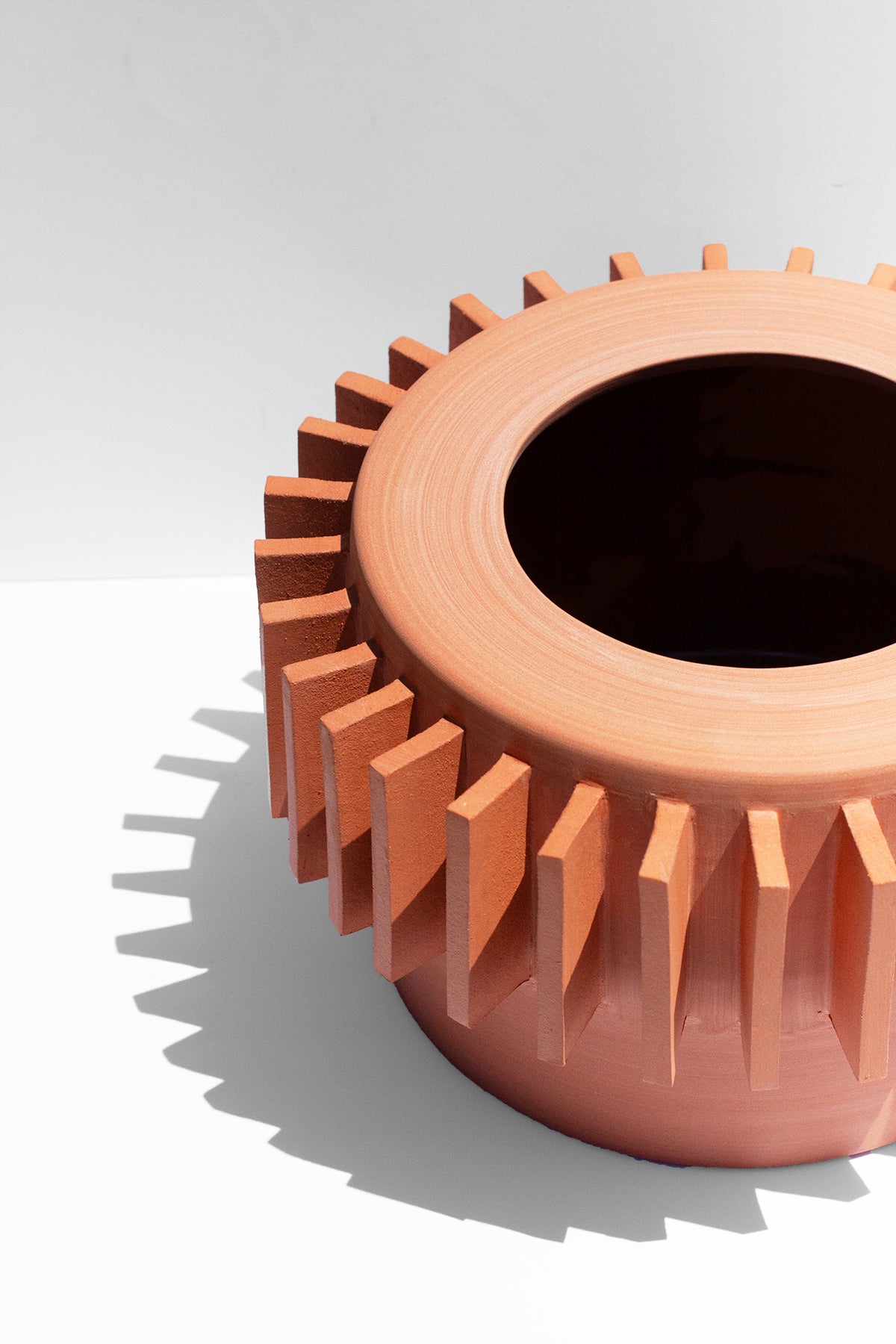 Handmade Terra cotta planter with flange design around the outside