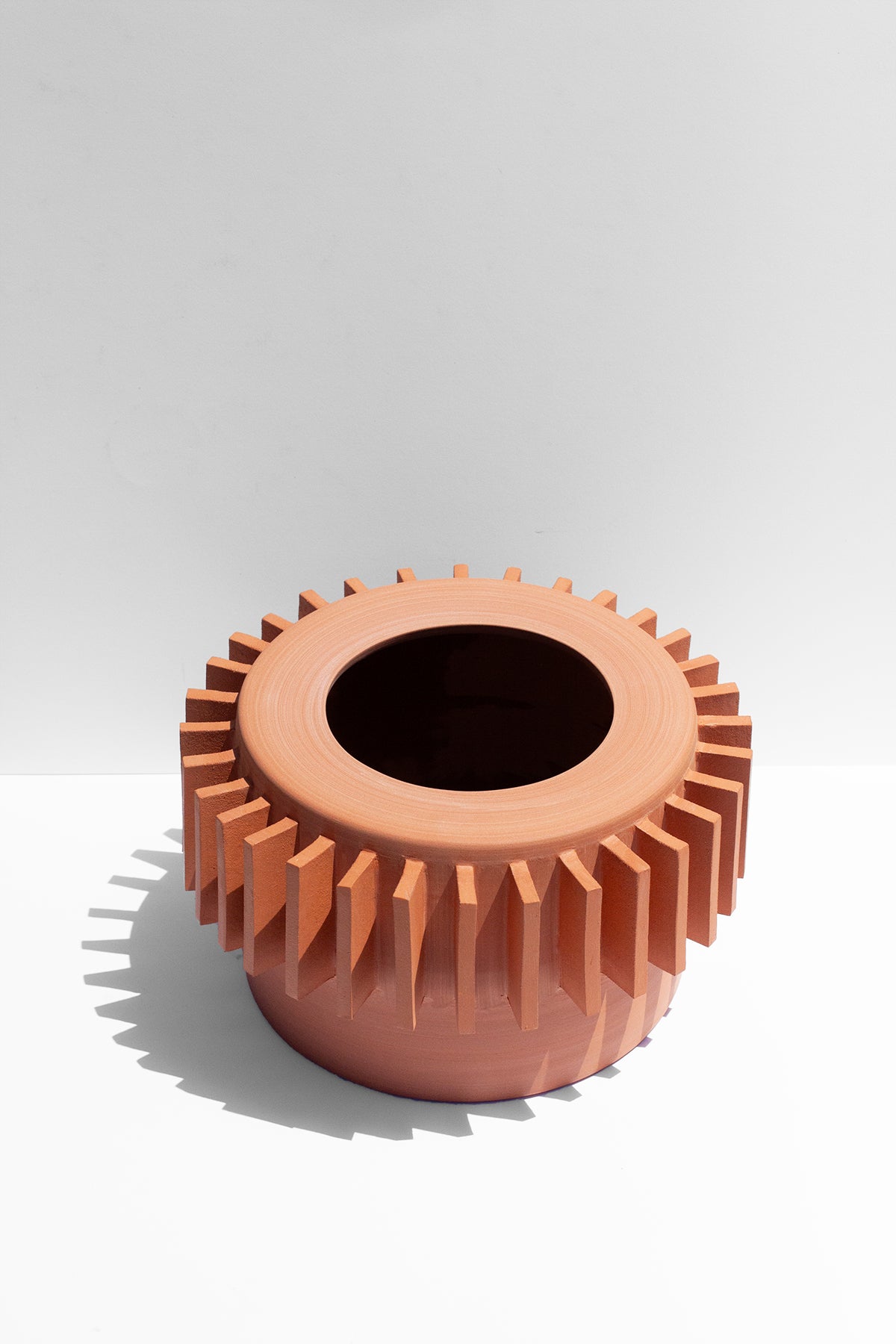 Handmade Terra cotta planter with flange design around the outside