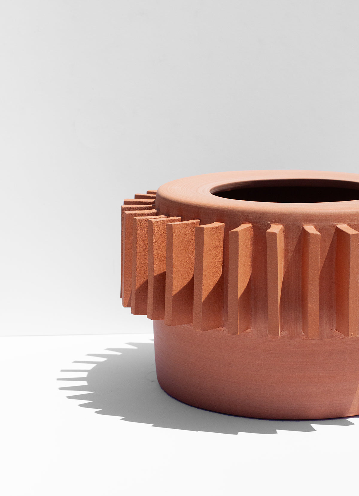 Handmade Terra cotta planter with flange design around the outside