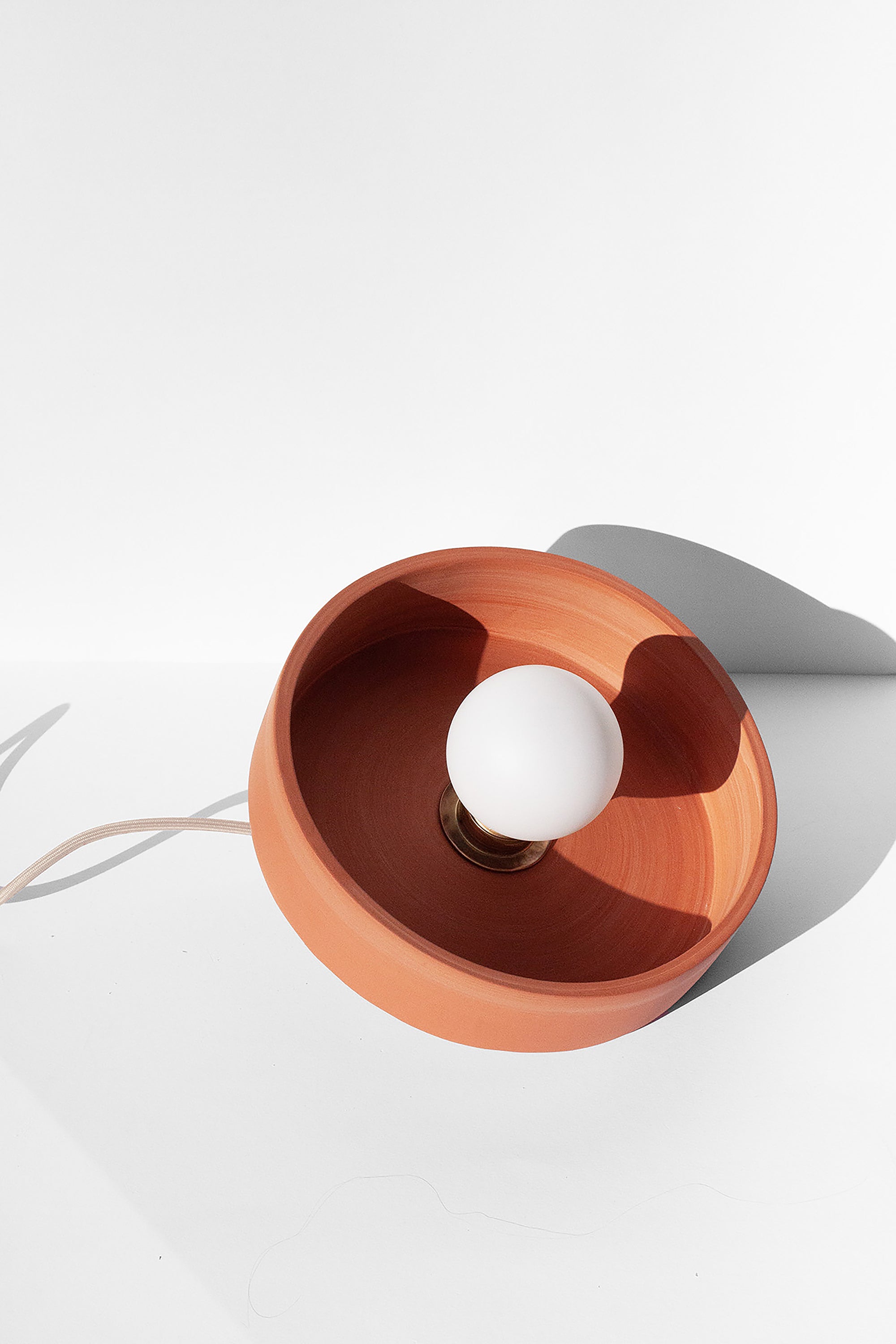 Handmade Terra cotta pendant light with minimalist shape