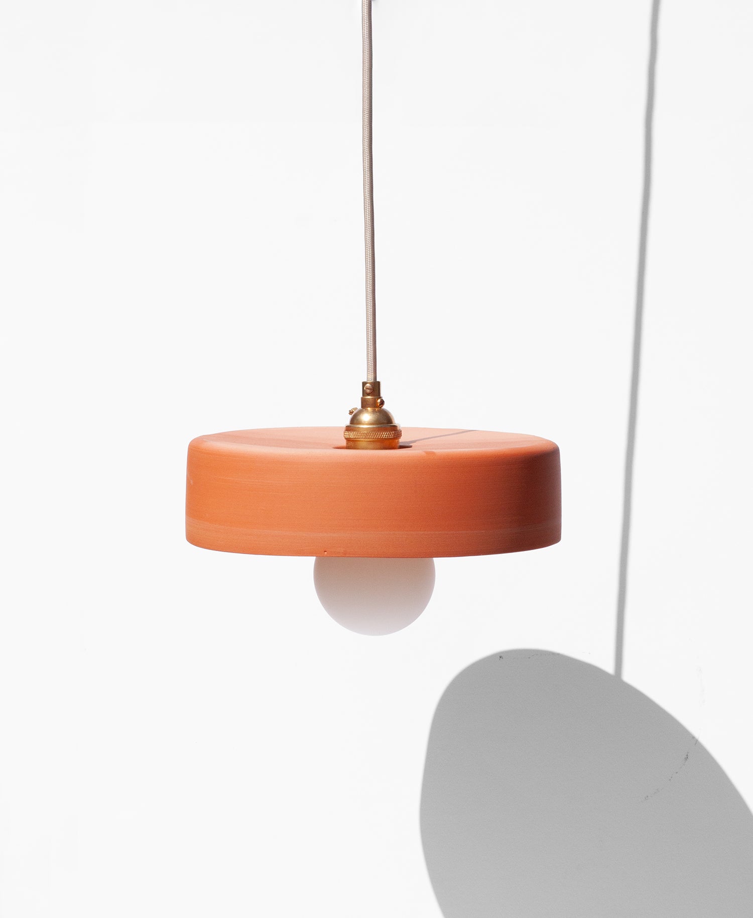 Handmade Terra cotta pendant light with minimalist shape