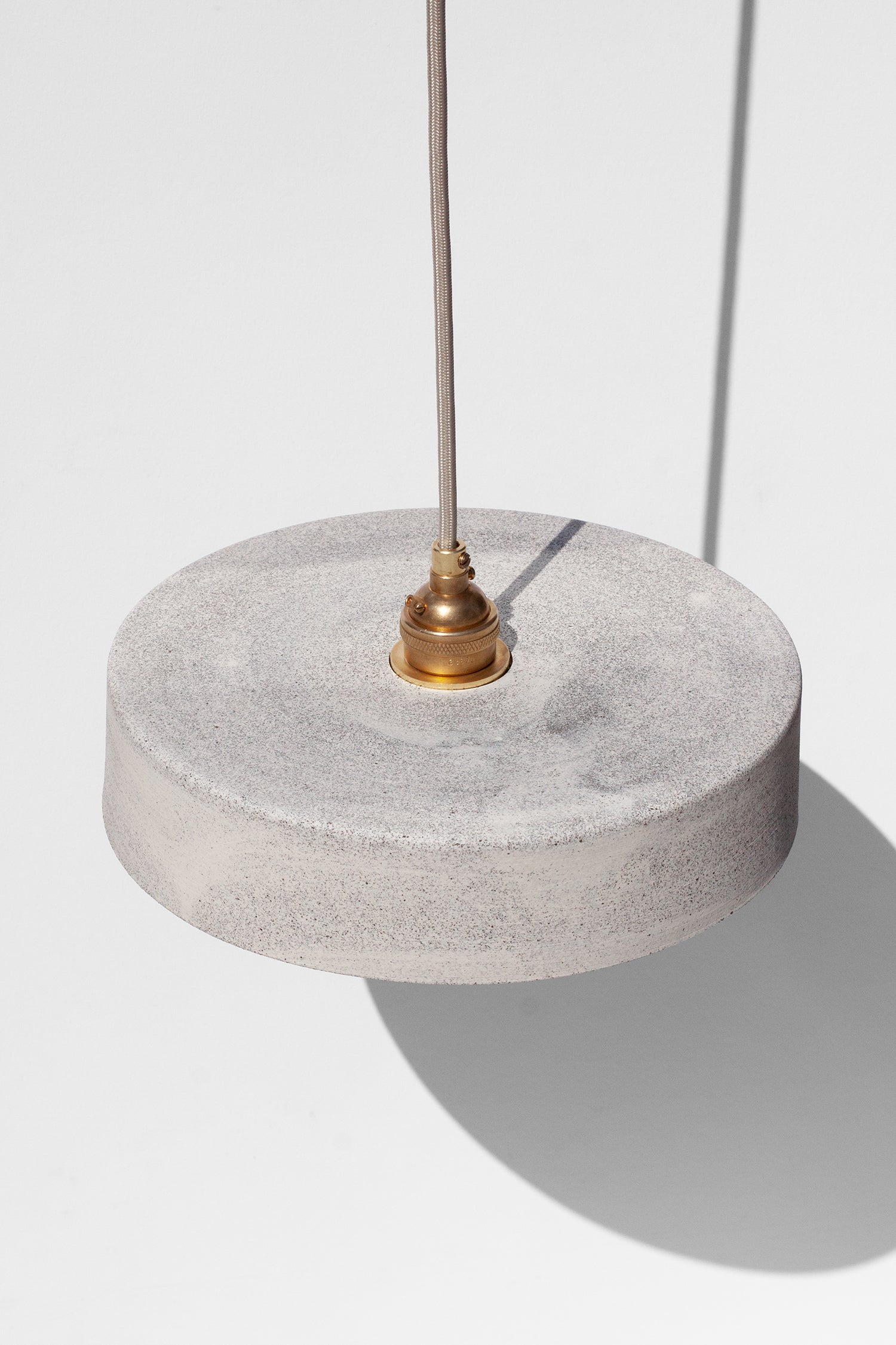 Handmade White pendant light with concentric circle design and speckled finish