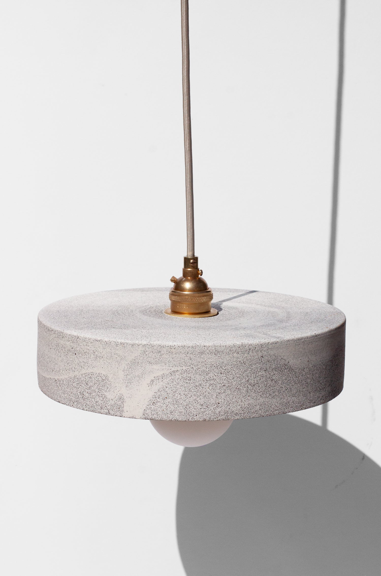 Handmade White pendant light with concentric circle design and speckled finish